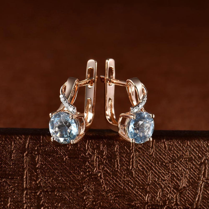 Elegant 14k Rose Gold Jewelry Set with Sky Blue Topaz and Diamond Accents - Earrings, Ring, and Pendant - Lucid Fantasy 