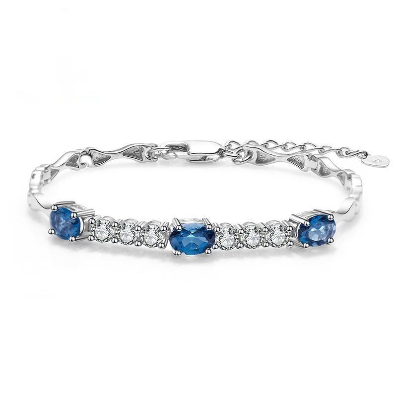 Elegant Sterling Silver Bracelet with London Blue Topaz and CZ Accents - Lucid Fantasy 