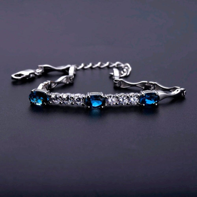 Elegant Sterling Silver Bracelet with London Blue Topaz and CZ Accents - Lucid Fantasy 