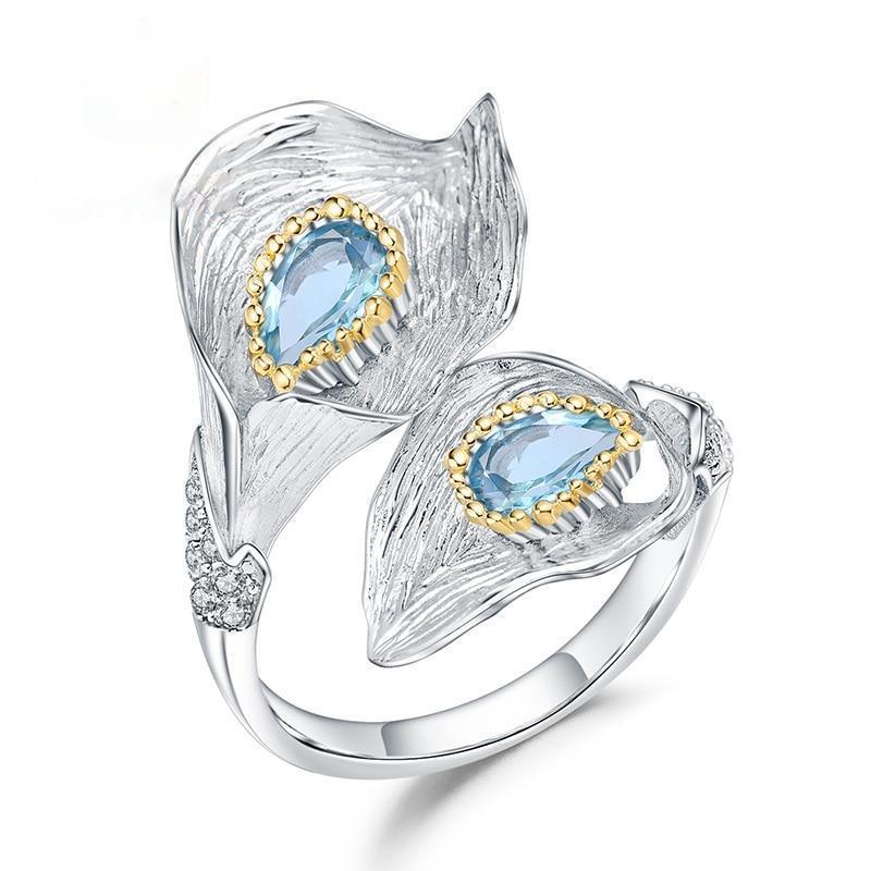 Handcrafted Sterling Silver Calla Lily Ring with Swiss Blue Topaz and Gold Accents - Lucid Fantasy 