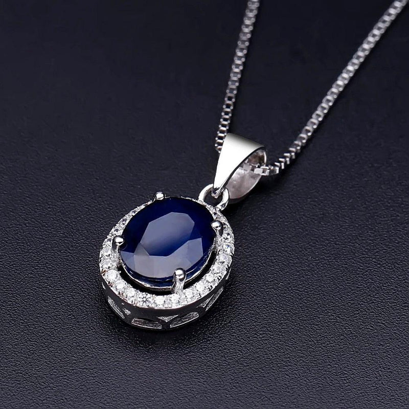 Luxurious Oval Blue Sapphire and Cubic Zirconia Pendant Necklace in Sterling Silver - Lucid Fantasy 