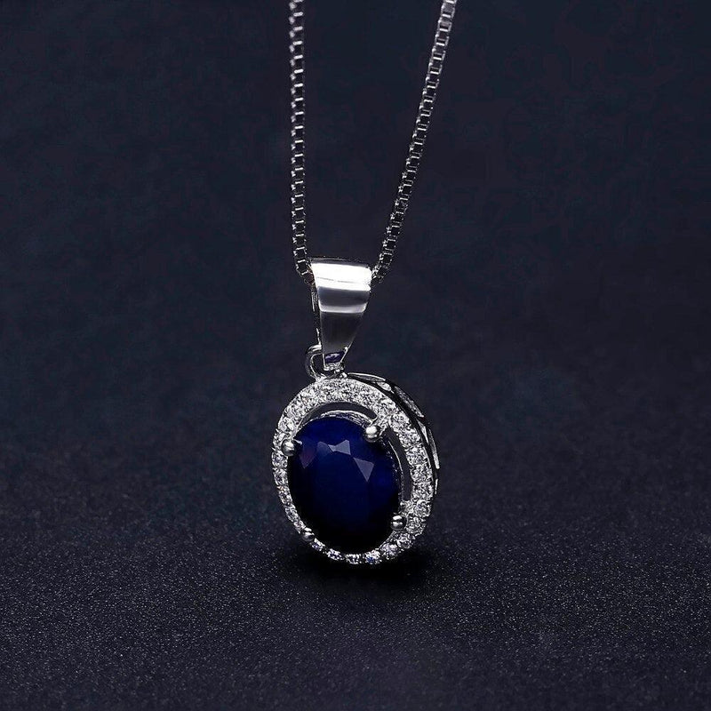 Luxurious Oval Blue Sapphire and Cubic Zirconia Pendant Necklace in Sterling Silver - Lucid Fantasy 