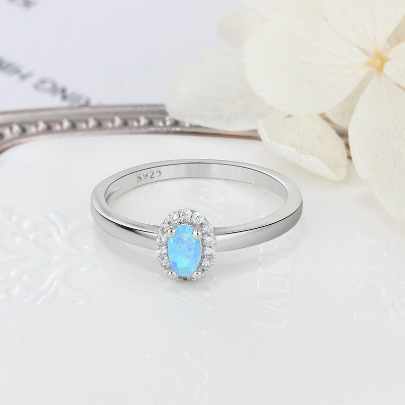 Sterling Silver Opal Halo Ring with White/Blue Cabochon and CZ Accents - Lucid Fantasy 