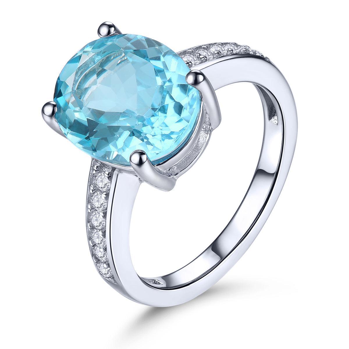 Sterling Silver Statement Cocktail Ring with 5.8ct Oval Sky Blue Topaz and Sparkling White CZ Accents - Lucid Fantasy 